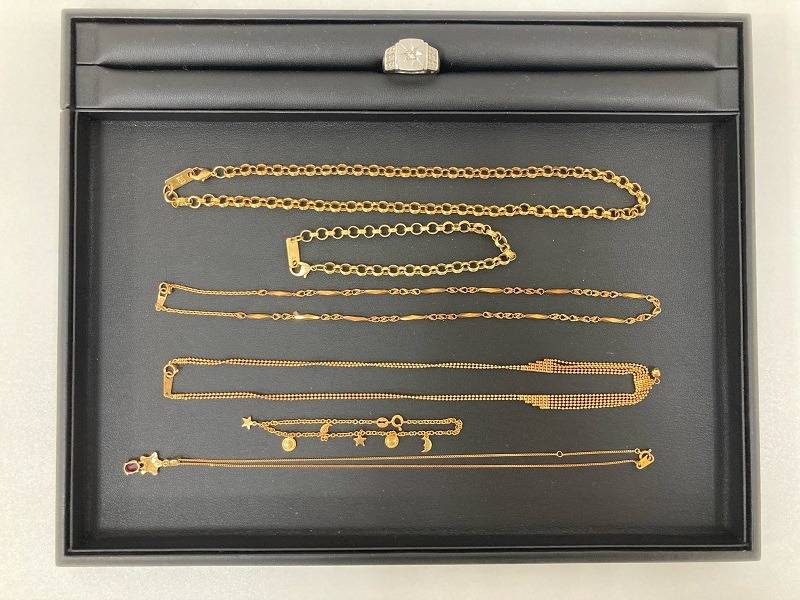 ダイヤモンド付きのプラチナリングと金のアクセサリー類 | お買取り